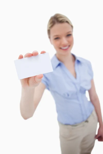 Blank business card being held by smiling woman — Stock Photo, Image