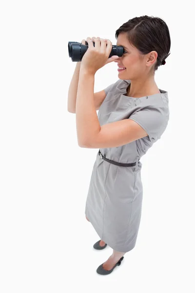 Side view of woman using spyglasses — Stock Photo, Image