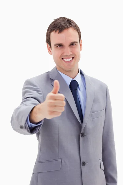 Uśmiechający się biznesmen dając kciuk w — Zdjęcie stockowe