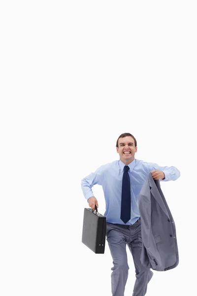 Glücklicher Geschäftsmann mit Koffer vor dem Sprung — Stockfoto