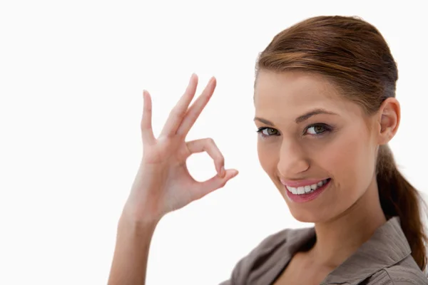 Side view of woman giving approval — Stock Photo, Image