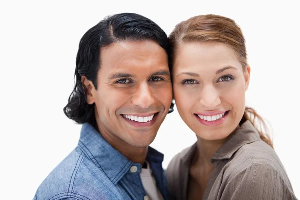 Smiling couple standing close together — Stock Photo, Image