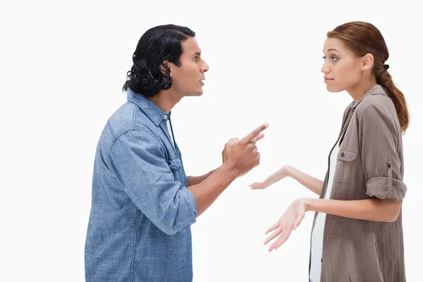 Side view of man asking his clueless girlfriend — Stock Photo, Image