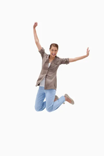 Cheerful woman jumping — Stock Photo, Image