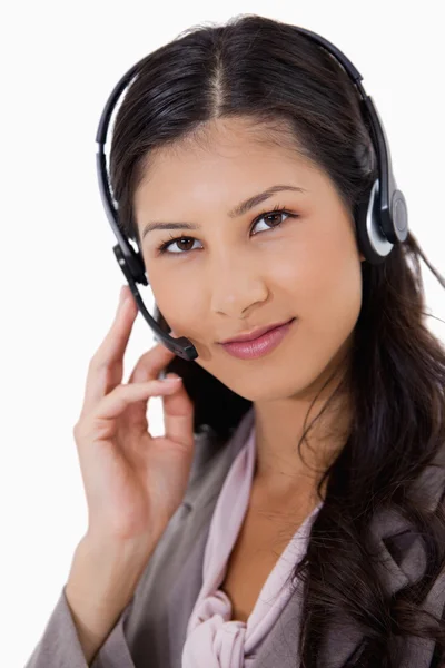 Mujer de negocios de aspecto seguro con auriculares —  Fotos de Stock