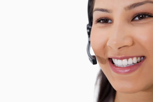 Sorrindo agente de call center feminino — Fotografia de Stock
