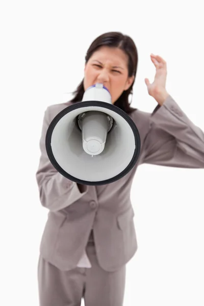 Mulher de negócios irritada gritando através de empresária — Fotografia de Stock
