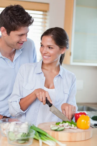 Portrait of a happy couple cooking — Stock Photo, Image