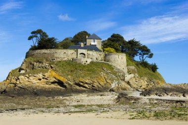 Landscape, seascape with beach and a house on top of a rock. clipart