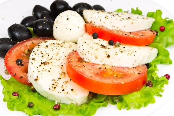 Salad of mozzarella, tomatoes, olives — Stock Photo, Image