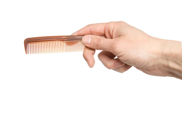 Hairbrush in een hand, het is geïsoleerd op de witte — Stockfoto