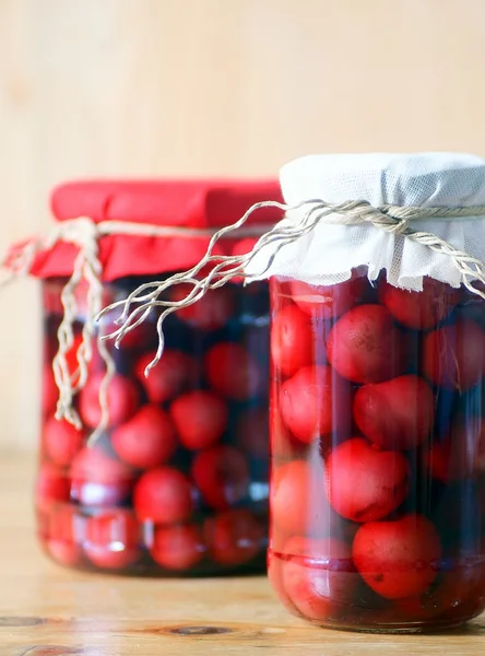 Two jars of cherry compote — Stock Photo, Image