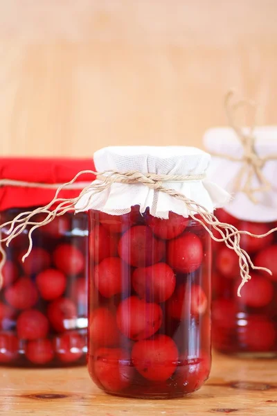 Jars with cherry compote — Stock Photo, Image