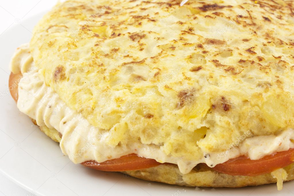 Spanish omelet stuffed with rice cream