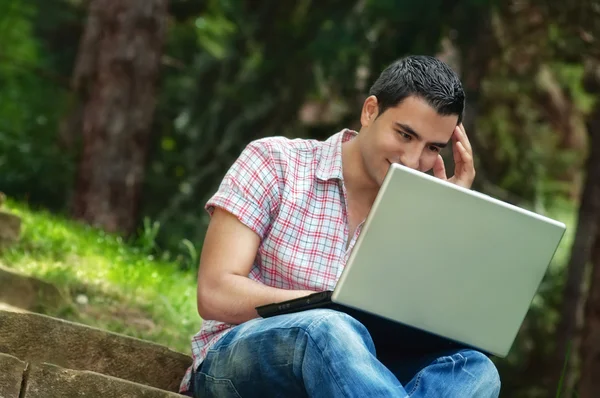 Young men with lap-top — Stock Photo, Image