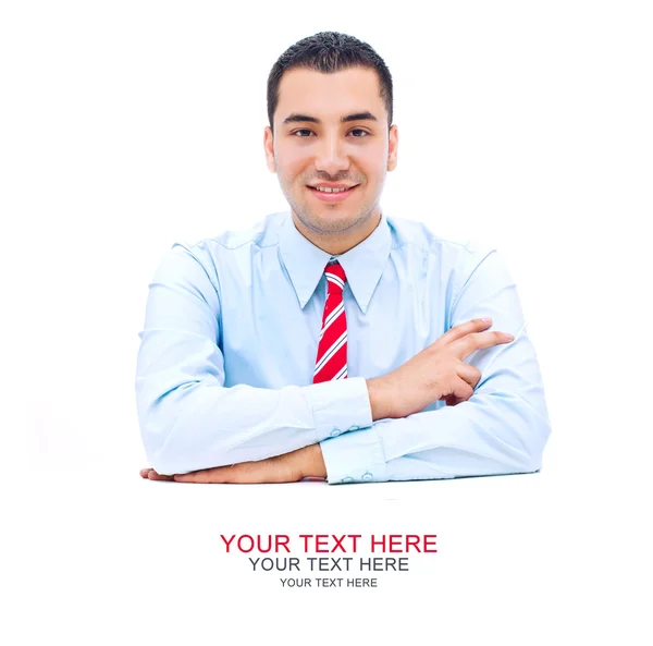 Pohledný mladý muž za stolem místo pro váš text — Stockfoto