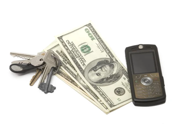 Dollar banknotes with cellphone and keys — Stock Photo, Image