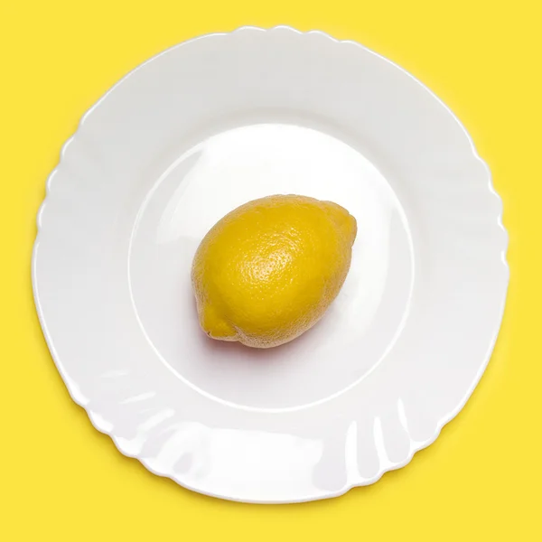 Stock image Lemon on a plate