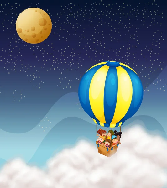 Kids in hot air balloon — Stock Vector