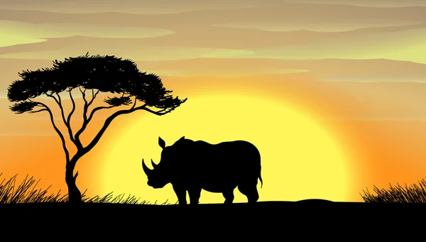 Носорог под деревом — стоковый вектор