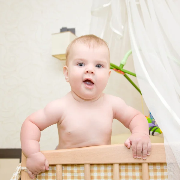 Baby in his crib — Stock Photo, Image