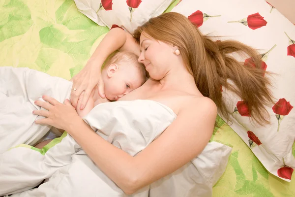 Mother is breast feeding baby. — Stock Photo, Image