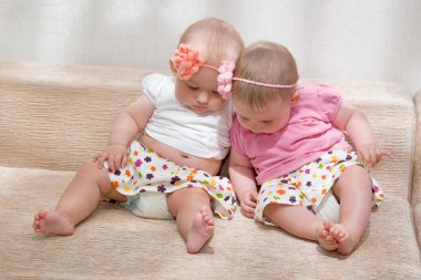 Twin baby girls talking clipart