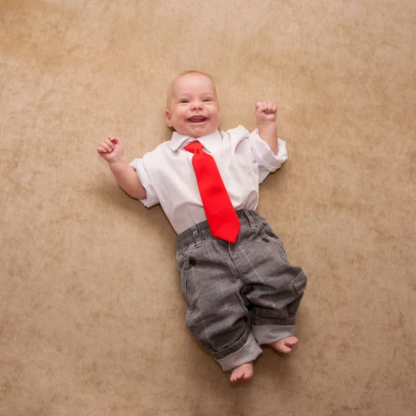 Baby in a business suit — Stock Photo, Image
