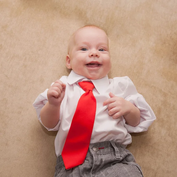 Baby in a business suit — Stock Photo, Image