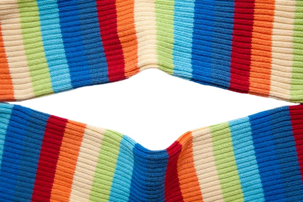Frame of multicolored knitted fabric in a diamond shape. — Stock Photo, Image