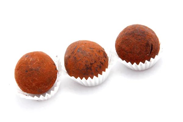 Tres trufas de chocolate negro —  Fotos de Stock