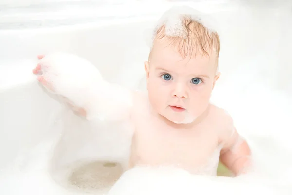 Cute baby is washing her hair — Stock Photo, Image