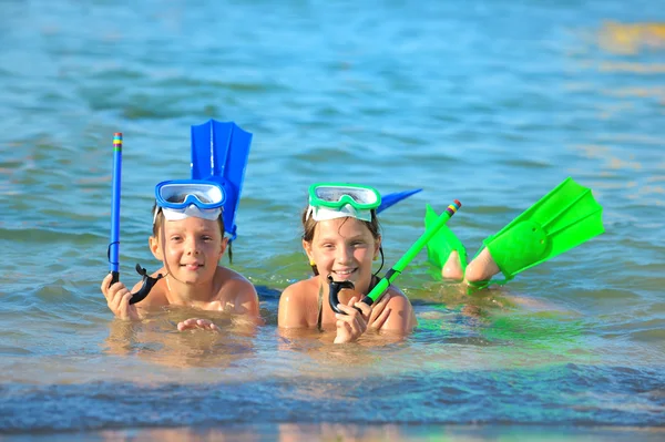 stock image Children on beach with snorkles