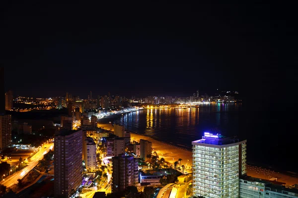 stock image Buildings on the beach at night