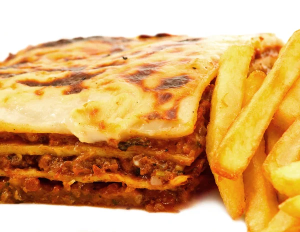 stock image Homemade traditional lasagna and fries