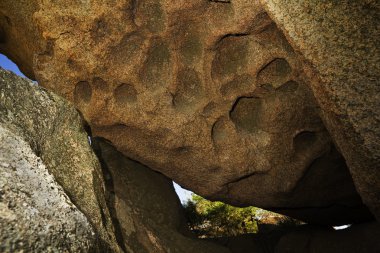 Shelter among rocks clipart