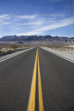 Highway going to Death Valley. clipart