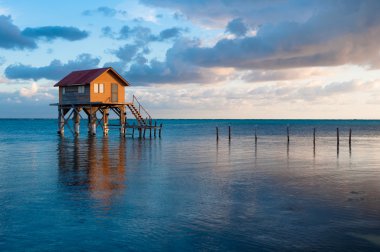 Home on the Ocean in Ambergris Caye Belize clipart