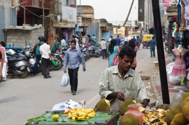 Vendor Selling Coconuts in Bangalore clipart