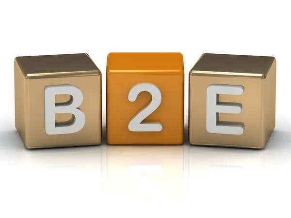 B2E bedrijf aan werknemer symbool op goud en oranje kubussen — Stockfoto