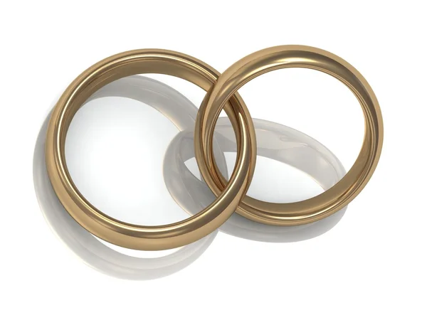 Zlatý snubní prsten v kruhu pro novomanžele — Stock fotografie