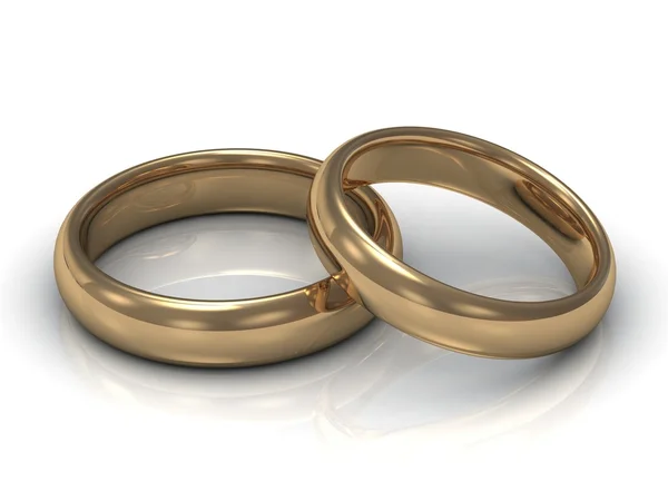 Wedding rings: one ring lies on the other — Stock Photo, Image