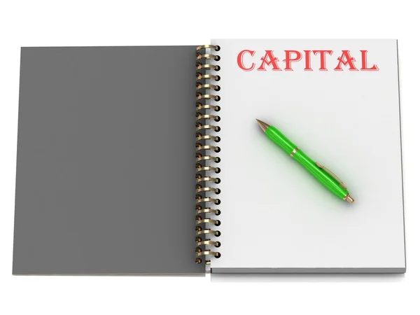 Kapital inskription på anteckningsboken sida — Stockfoto