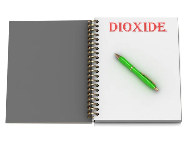 Надпись DIOXIDE на странице ноутбука — стоковое фото