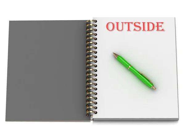 Напис OUTSIDE на сторінці ноутбука — стокове фото