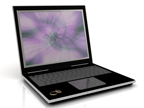 Namoro na Internet: anéis em um laptop — Fotografia de Stock