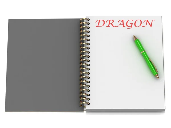 Слово DRAGON на сторінці ноутбука — стокове фото
