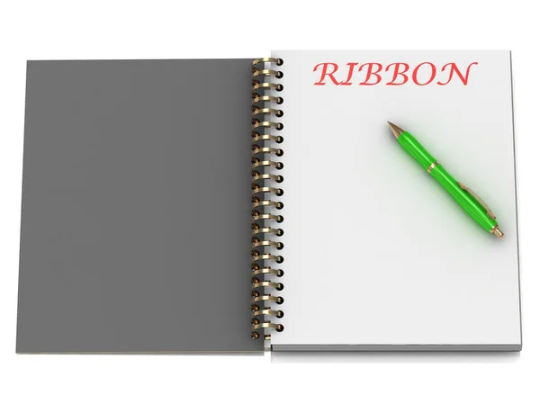 Слово RIBBON на странице ноутбука — стоковое фото