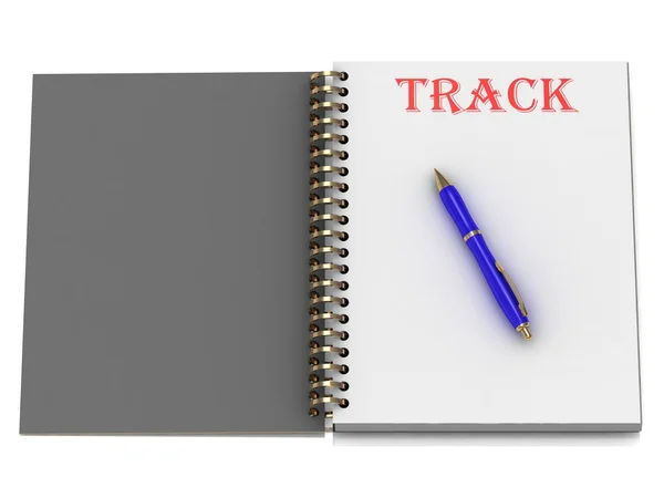 Track Word auf Notizbuchseite — Stockfoto