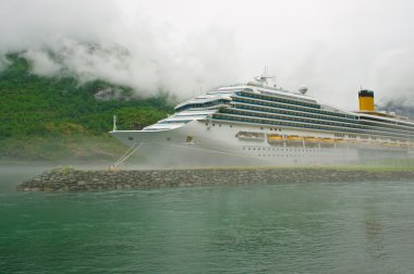 Large cruise ship in the western area of Norway. clipart